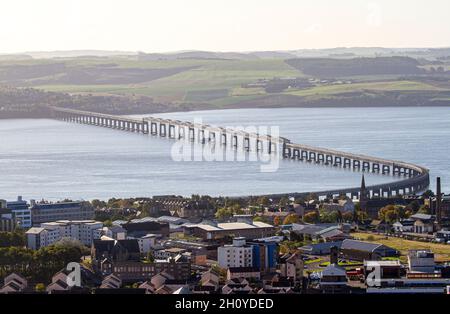 Dundee, Tayside, Scotland, UK.15th Oct, 2021. UK Weather: Warm and bright Autumn sunshine across North East Scotland, temperatures reaching 15°C. Autumn morning landscape of Dundee and the calm River Tay with the view of the 1800`s Tay Railway bridge observed from the “Law” the remains of a volcanic sill and is the highest view point in the city. Credit: Dundee Photographics/Alamy Live News Stock Photo